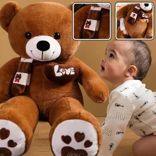ours marron peluche bebe ontent